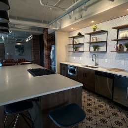 a community kitchen with a large island