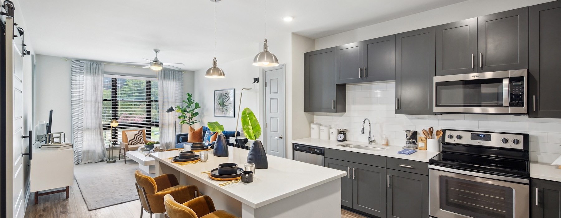 a kitchen with a table and chairs