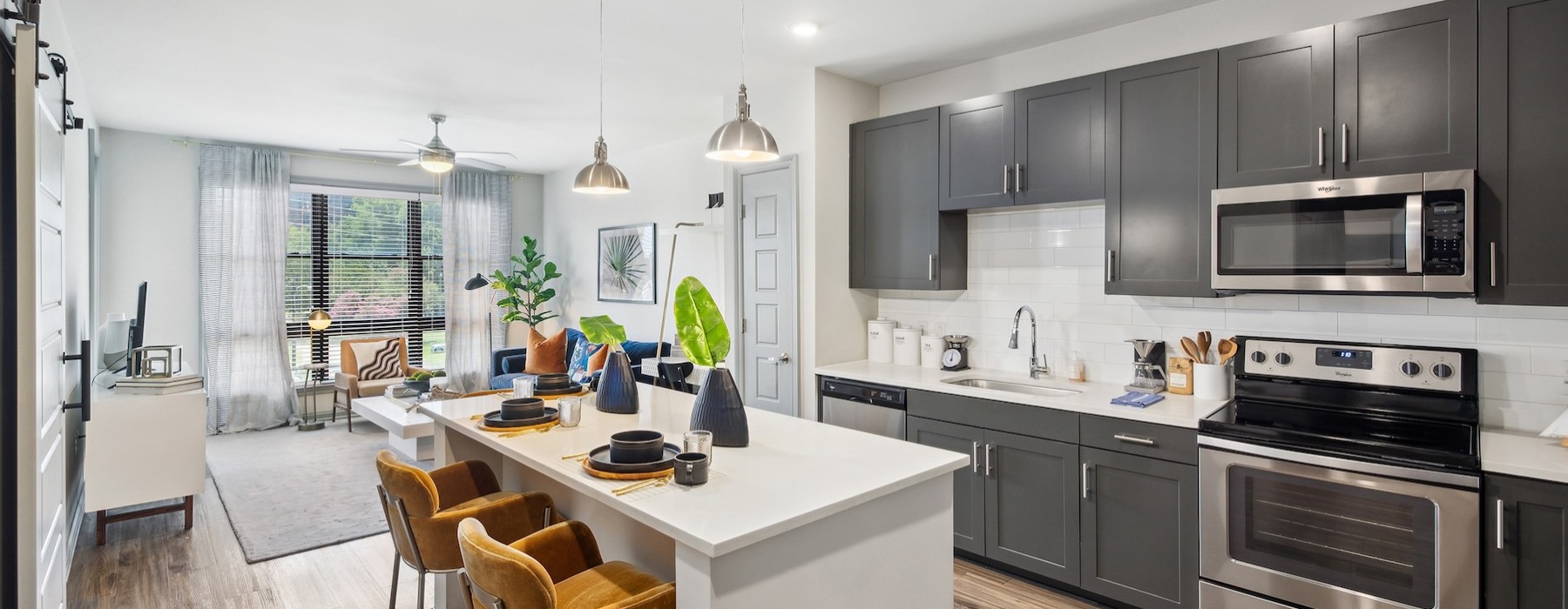 a kitchen with a table and chairs